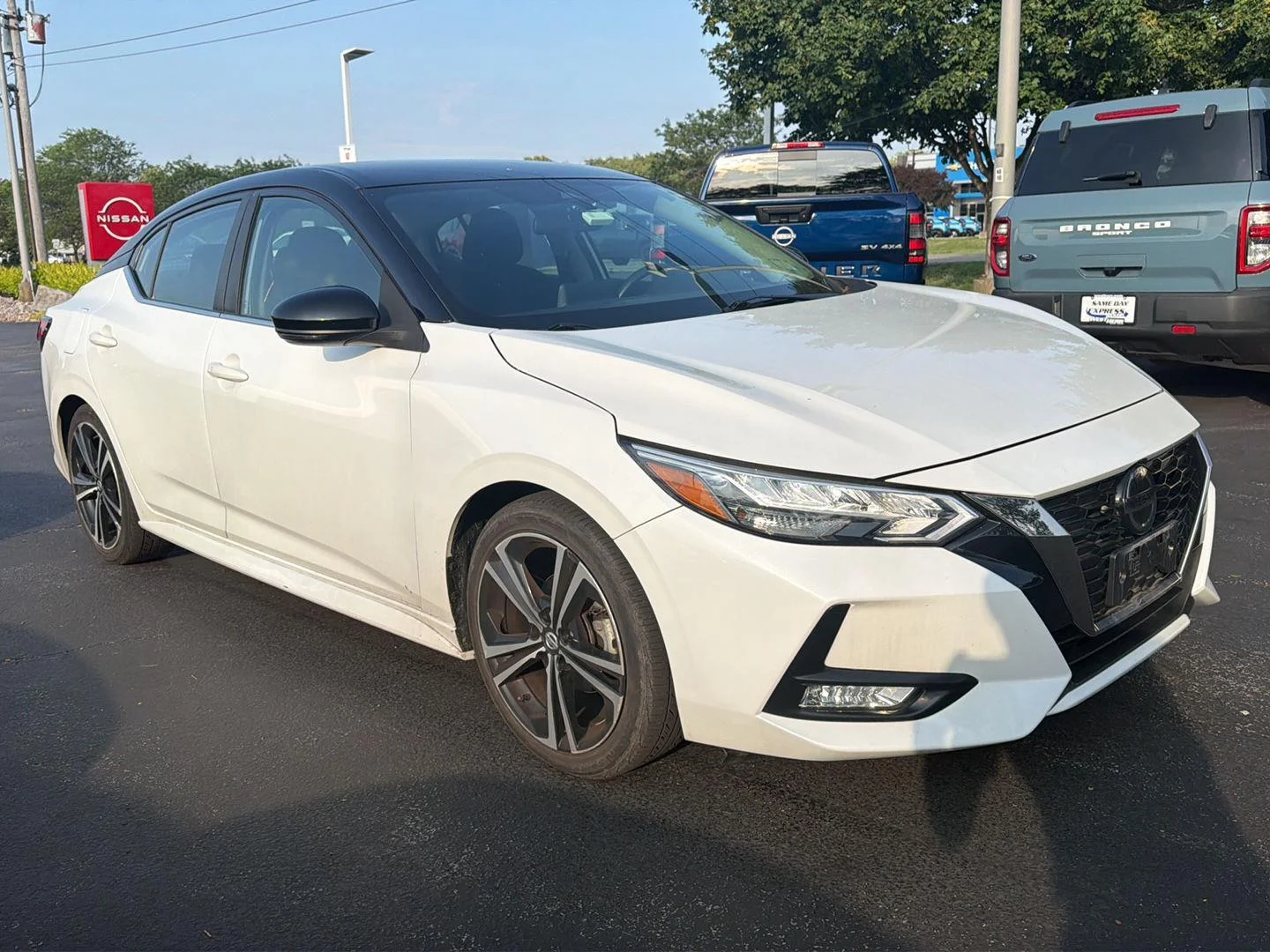 Used 2021 Aspen White/Super Black Nissan SR image 3