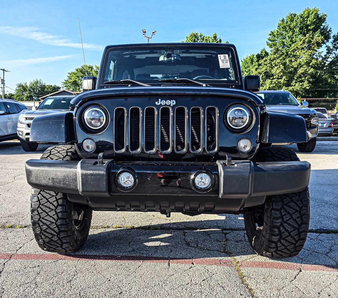Used 2016 Black Jeep Sahara image 1