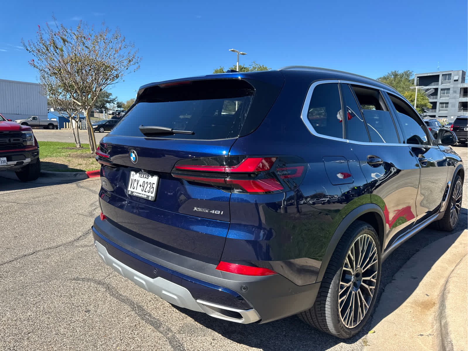 Used 2024 Tanzanite Blue II Metallic BMW xDrive40i image 3