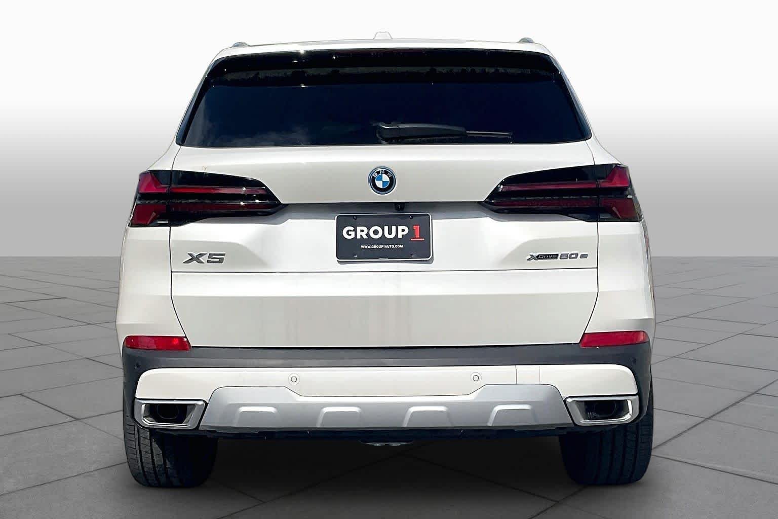 Used 2026 Mineral White Metallic BMW xDrive50e image 4