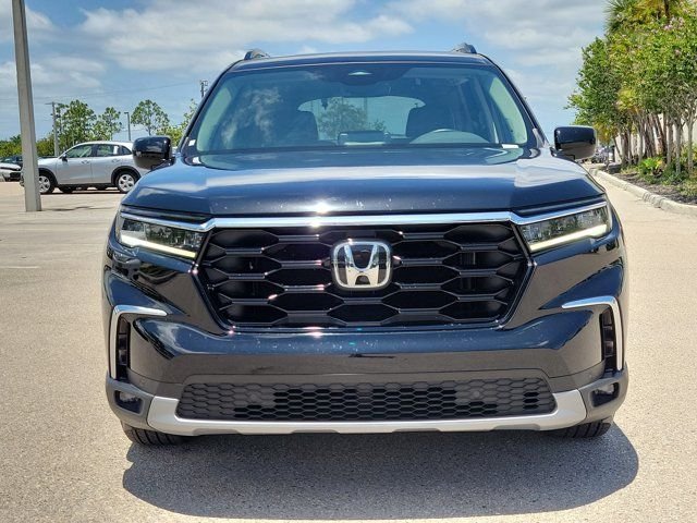 Used 2025 Crystal Black Pearl Honda Touring image 2