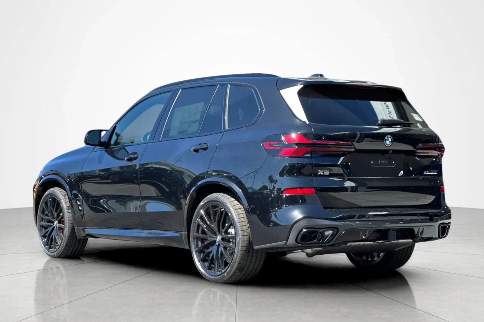 New 2026 Black Sapphire Metallic BMW M60i image 3
