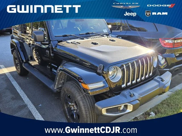 Used 2021 Black Jeep Unlimited Sahara 4xe image 1
