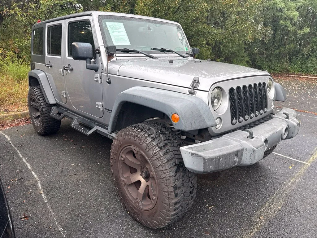 Used 2017 Silver Jeep Unlimited Sport image 1