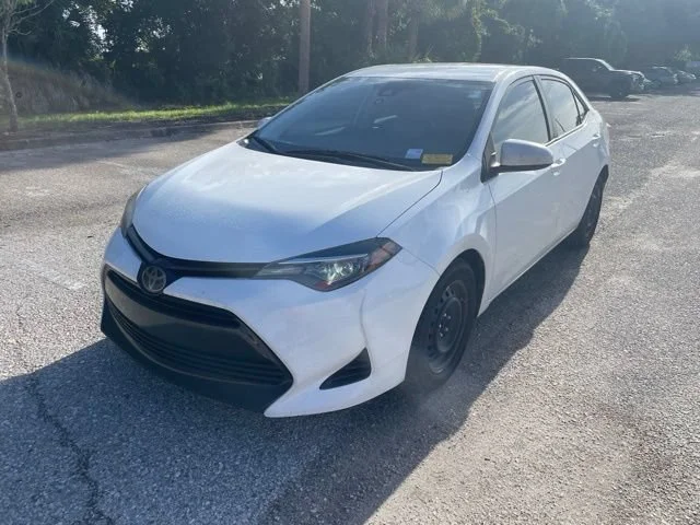 Used 2019 Super White Toyota LE image 5
