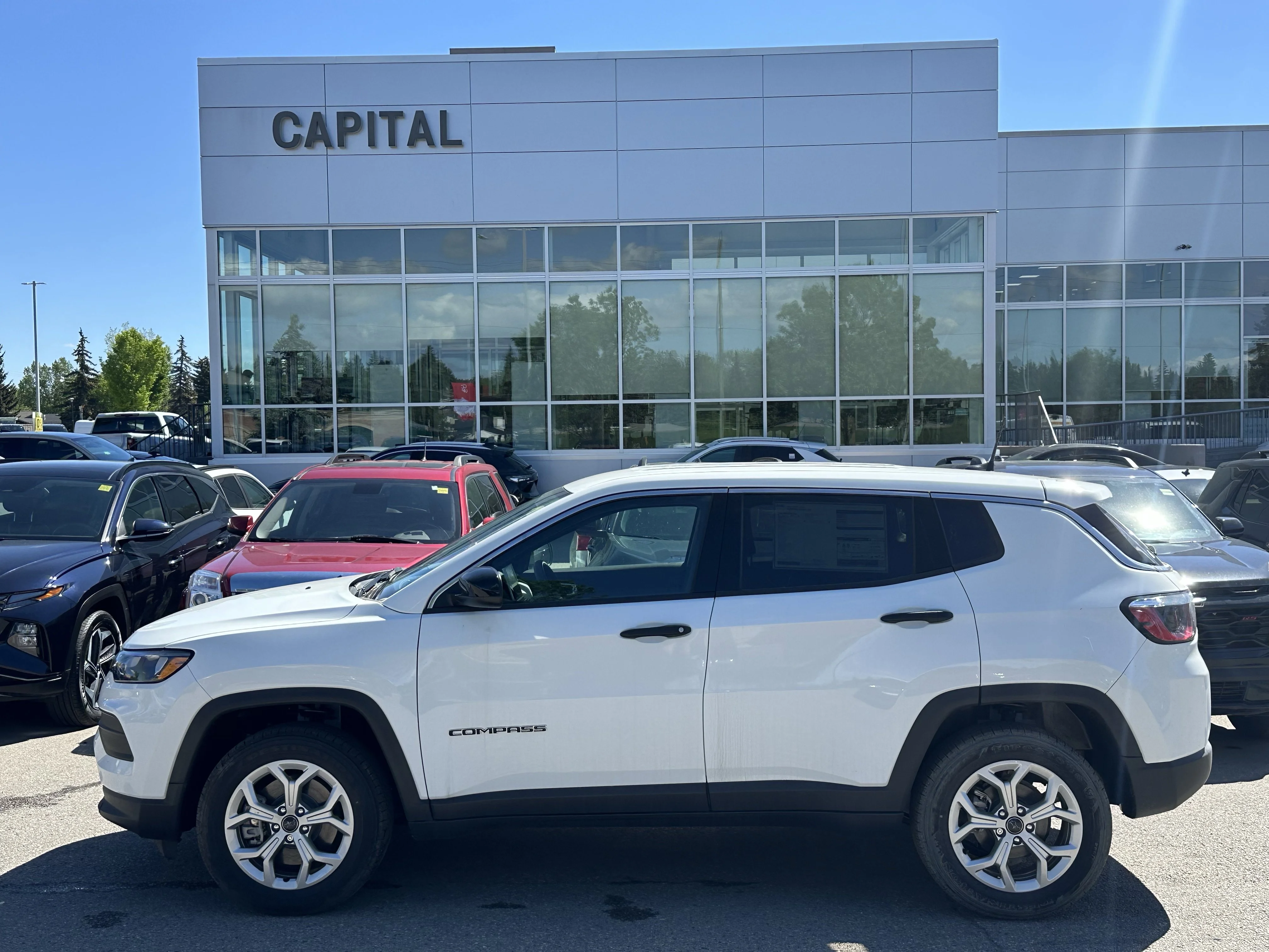 Certified Used 2026 Bright White Jeep Sport image 3