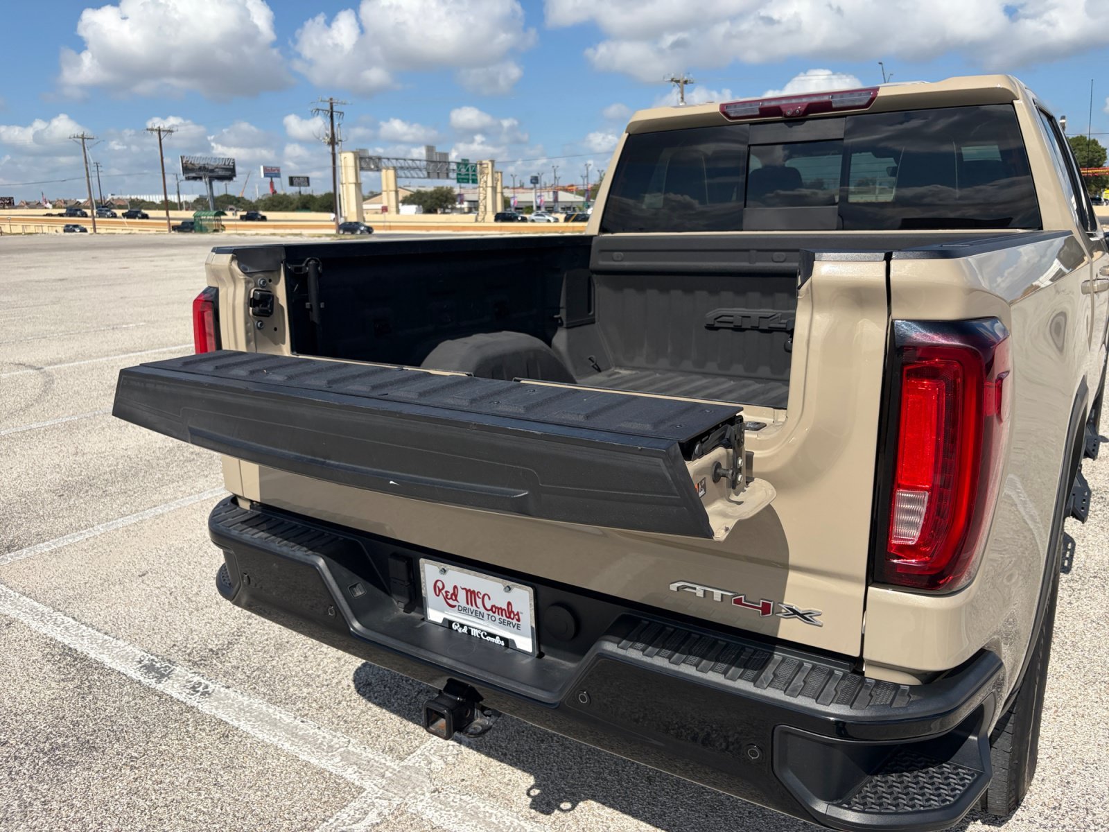 Used 2023 Desert Sand Metallic GMC AT4X image 26