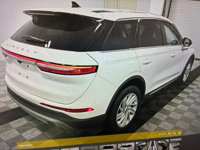 Used 2024 White Metallic Lincoln Premiere image 4
