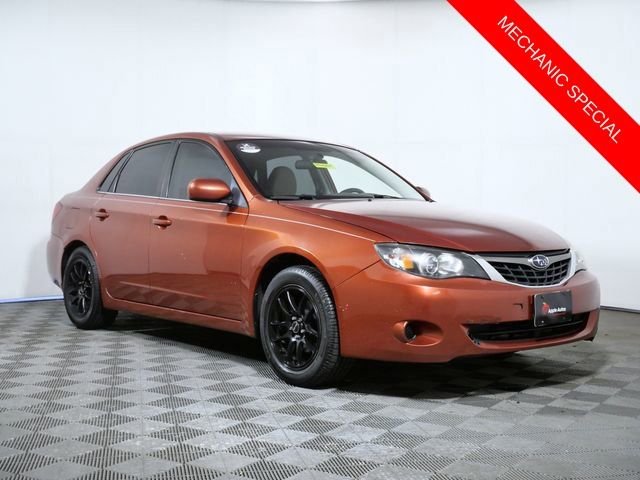 Used 2009 Red Subaru 2.5i image 1