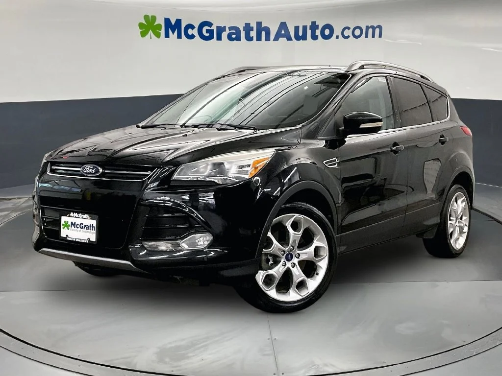 Used 2013 Ford Escape Titanium with VIN 1FMCU9J91DUD91253 for sale in Iowa City, IA