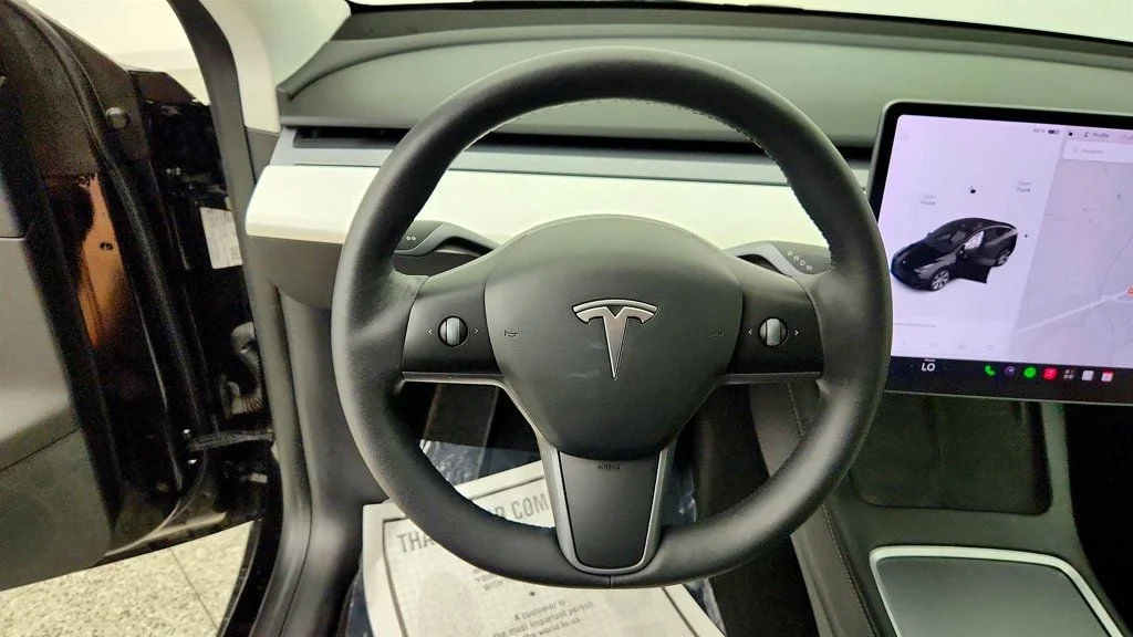 Used 2021 Solid Black Tesla Long Range AWD w/ White/Black 7-Seat Interior image 13