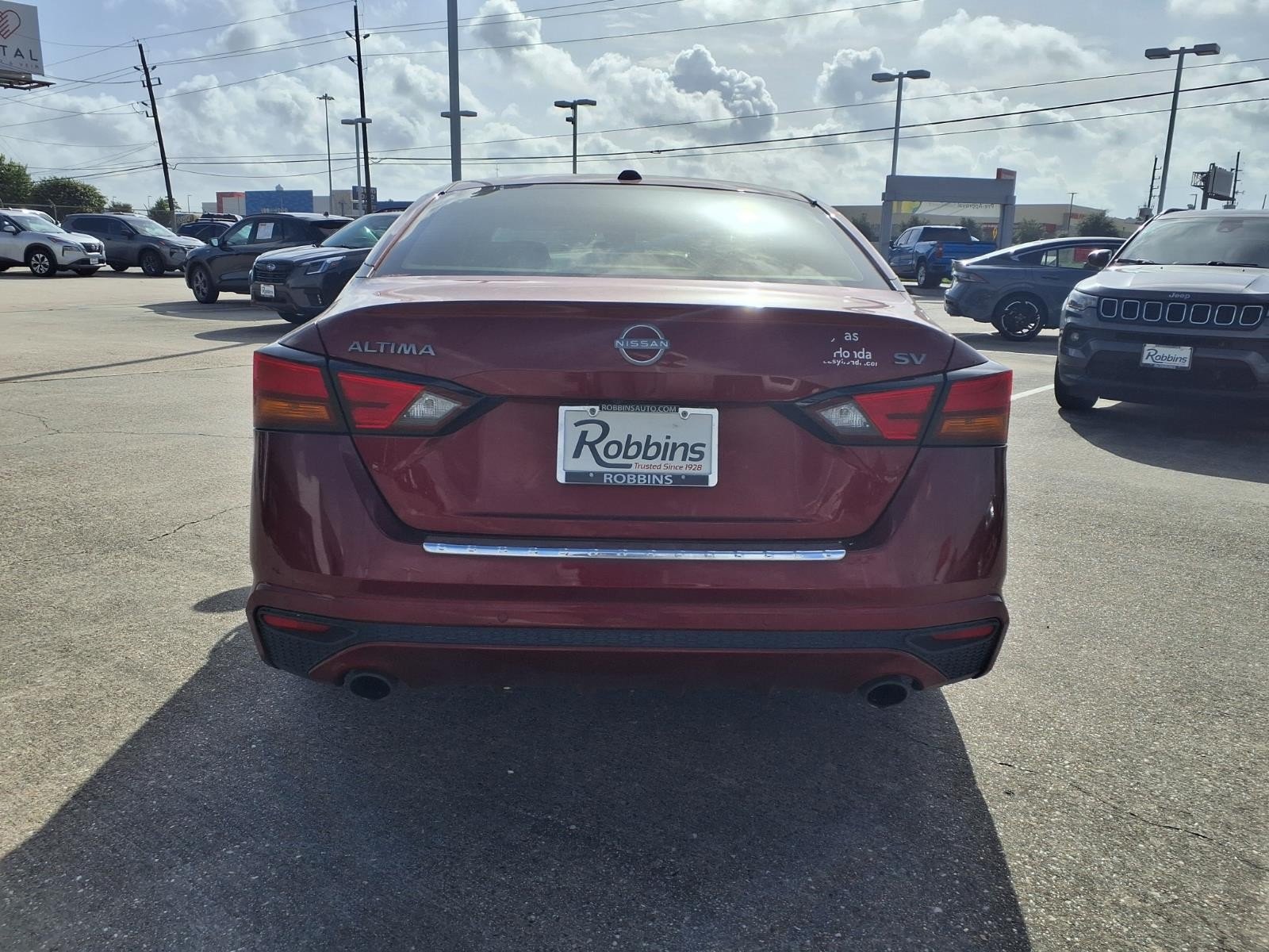 2023 Nissan Altima 2.5 SV Red at Robbins Nissan