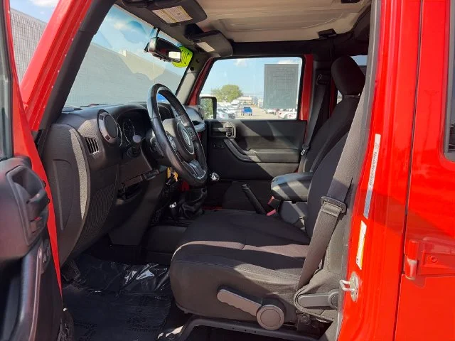 Used 2015 Orange Jeep Unlimited Sport image 9