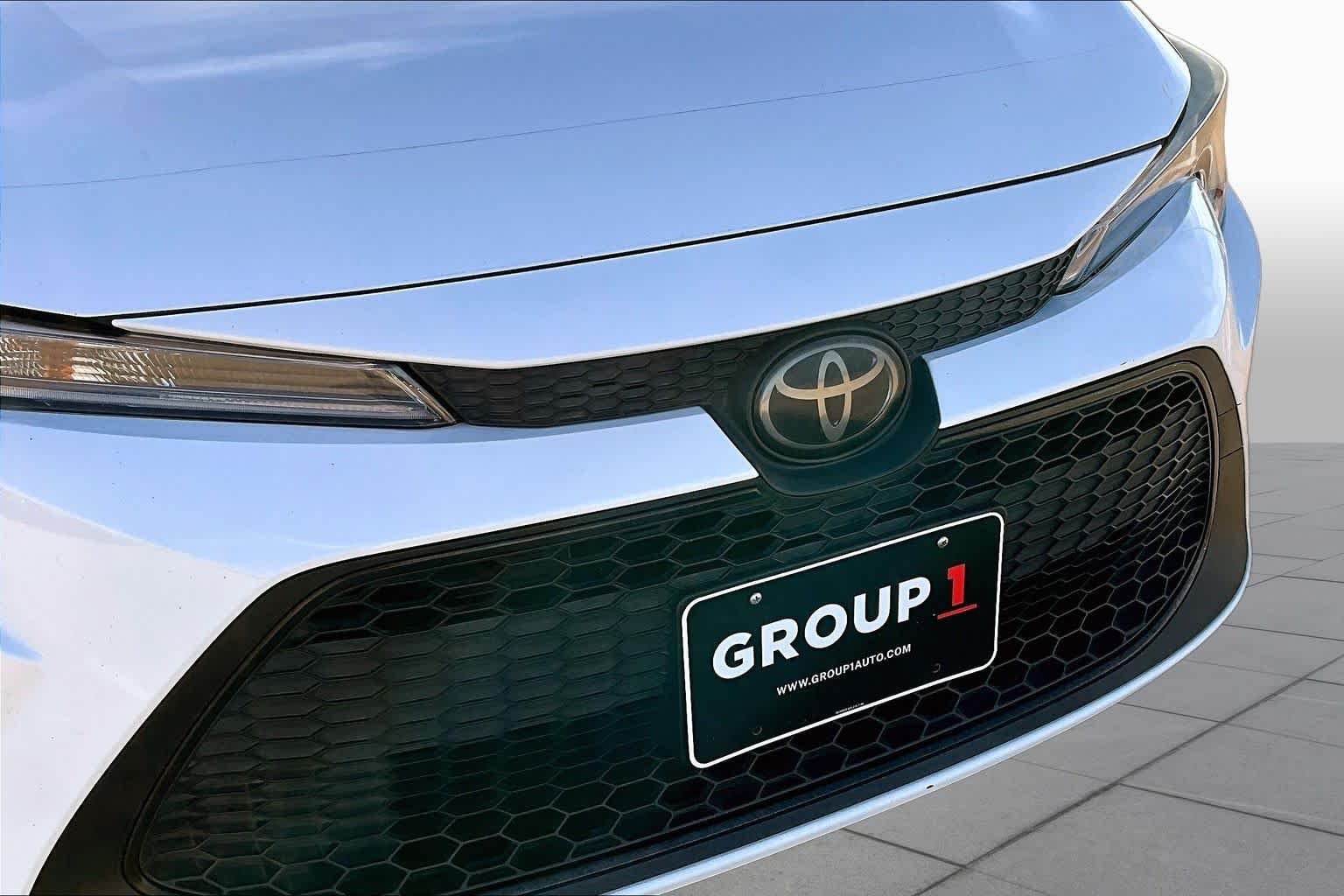 Used 2021 Super White Toyota LE image 30