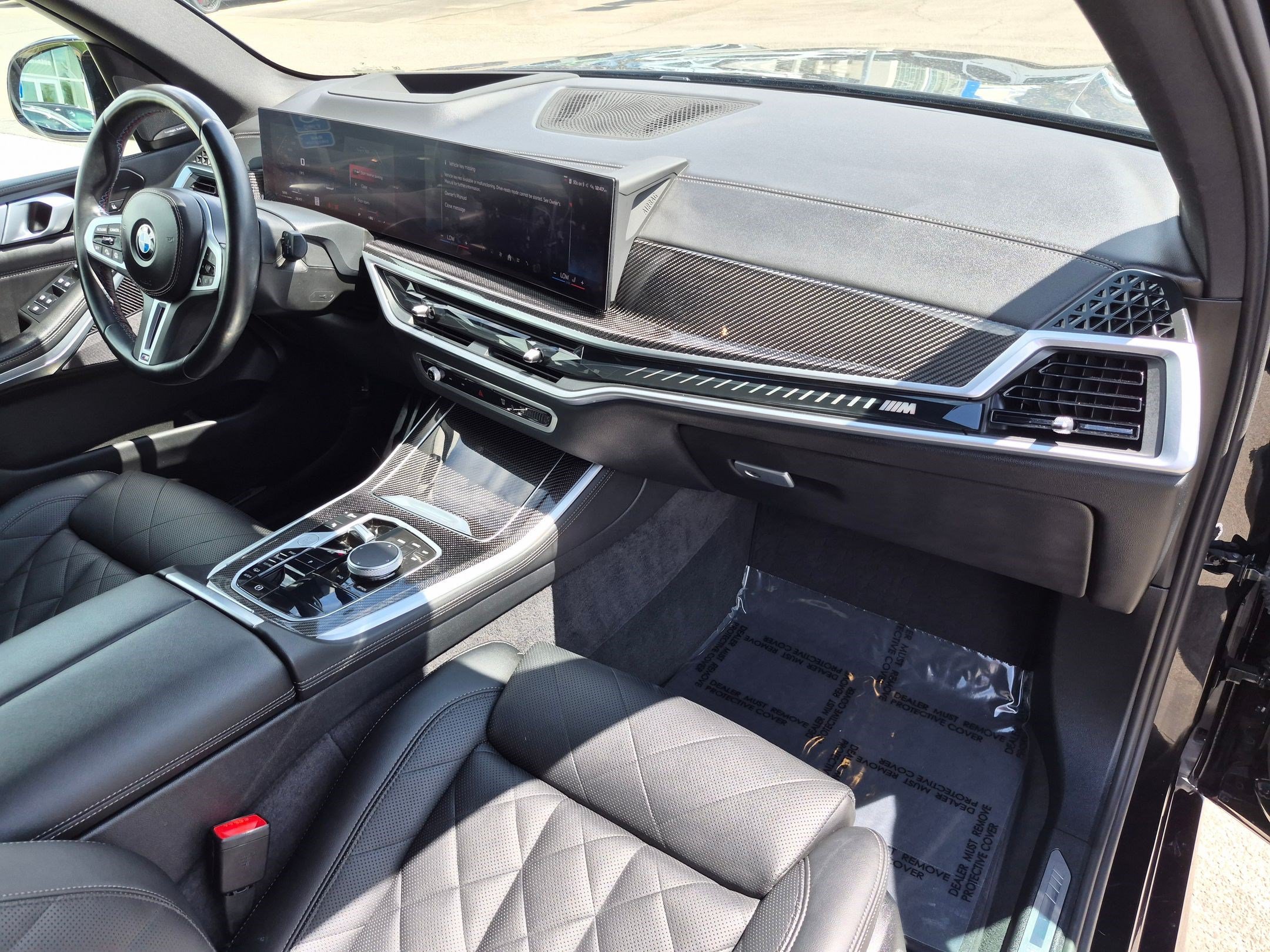 Used 2025 Black Sapphire Metallic BMW M60i image 34