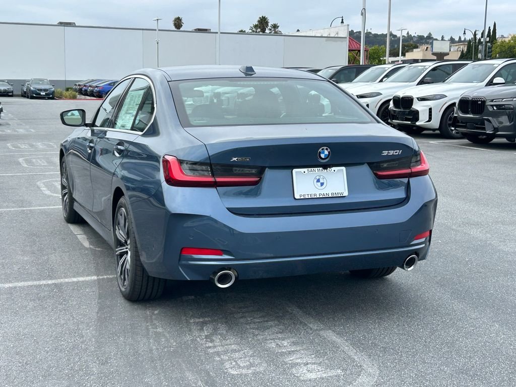 New 2026 Arctic Race Blue metallic BMW 330i xDrive image 3
