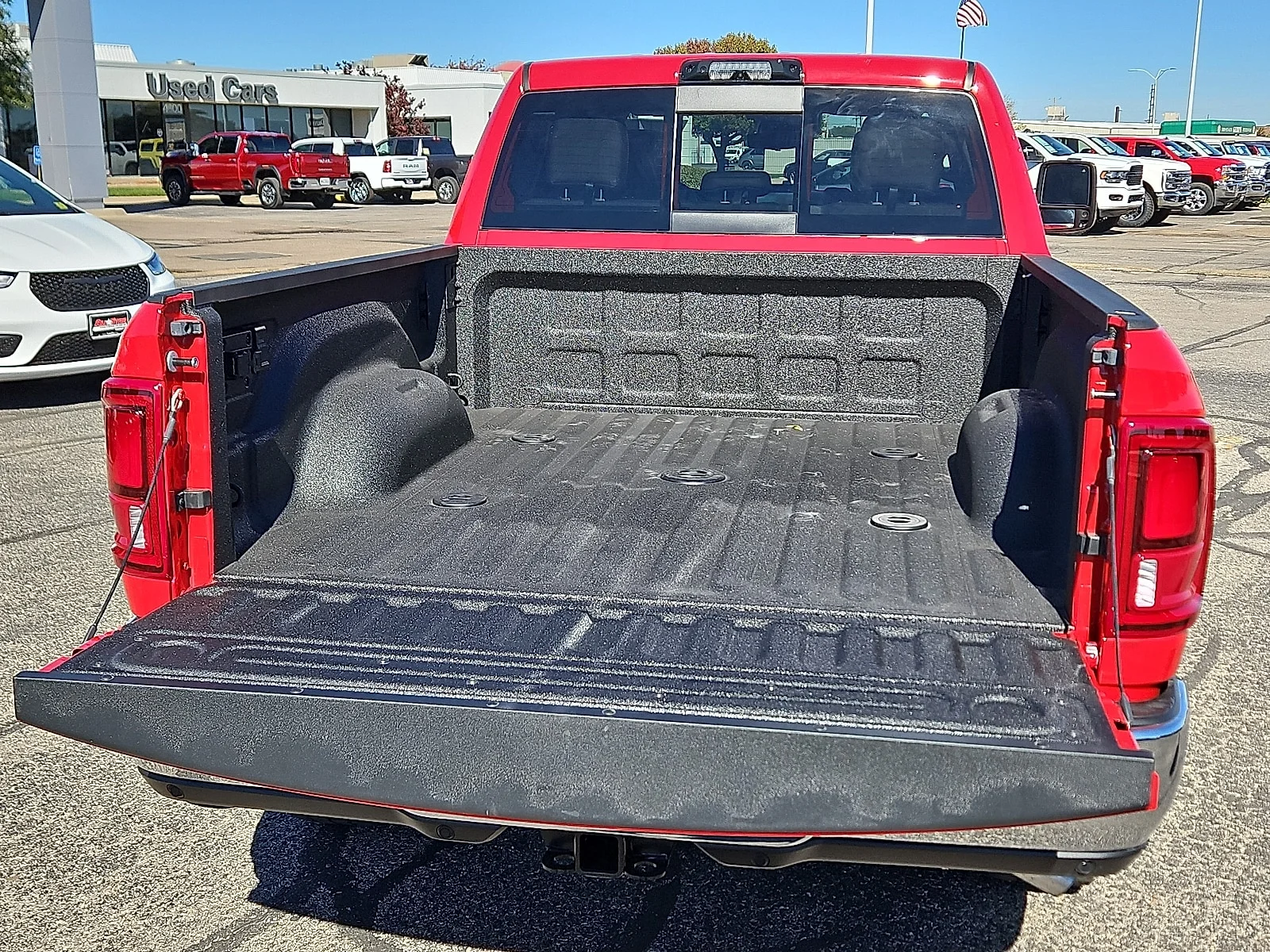 New 2026 Flame Red Ram LIMITED LONGHORN CREW CAB 4X4 6