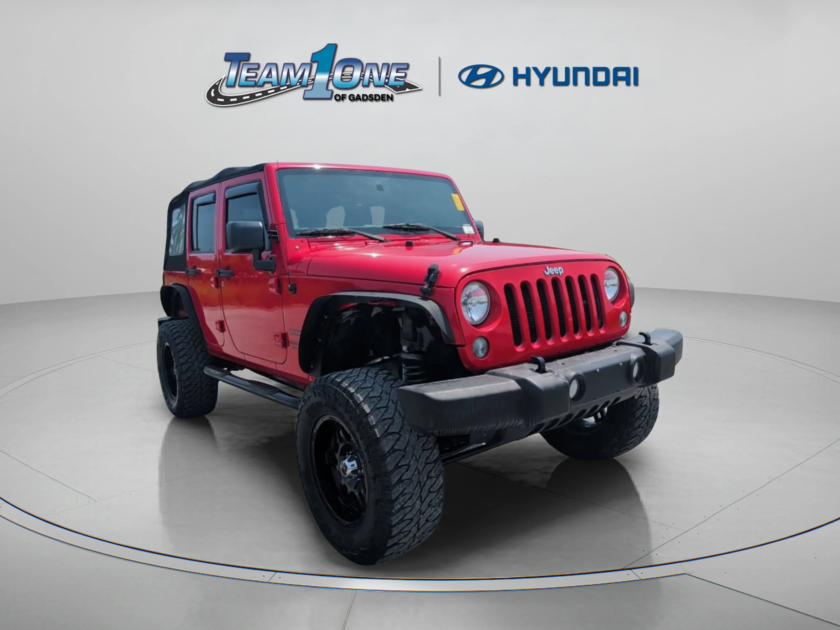 Used 2015 Firecracker Red Clear Coat Jeep Sport image 1