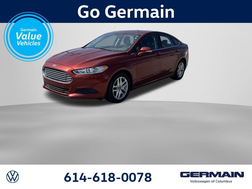 Used 2014 Sunset Metallic Ford SE image 1