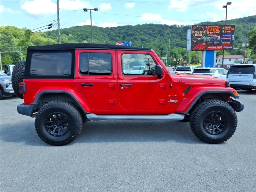 Used 2018 Red Jeep Unlimited Sahara image 7