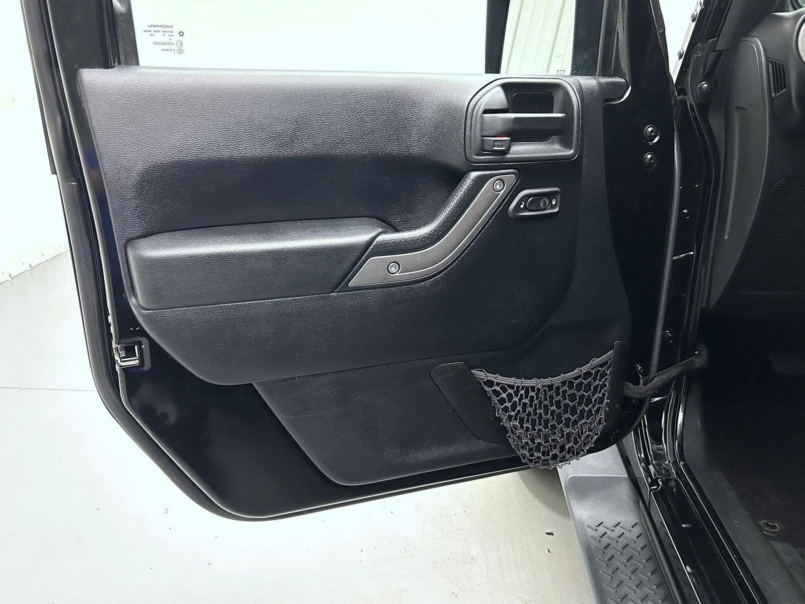 Used 2014 Black Jeep Unlimited Sport image 9