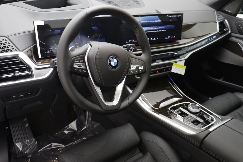 New 2026 Black Sapphire Metallic BMW xDrive50e image 7
