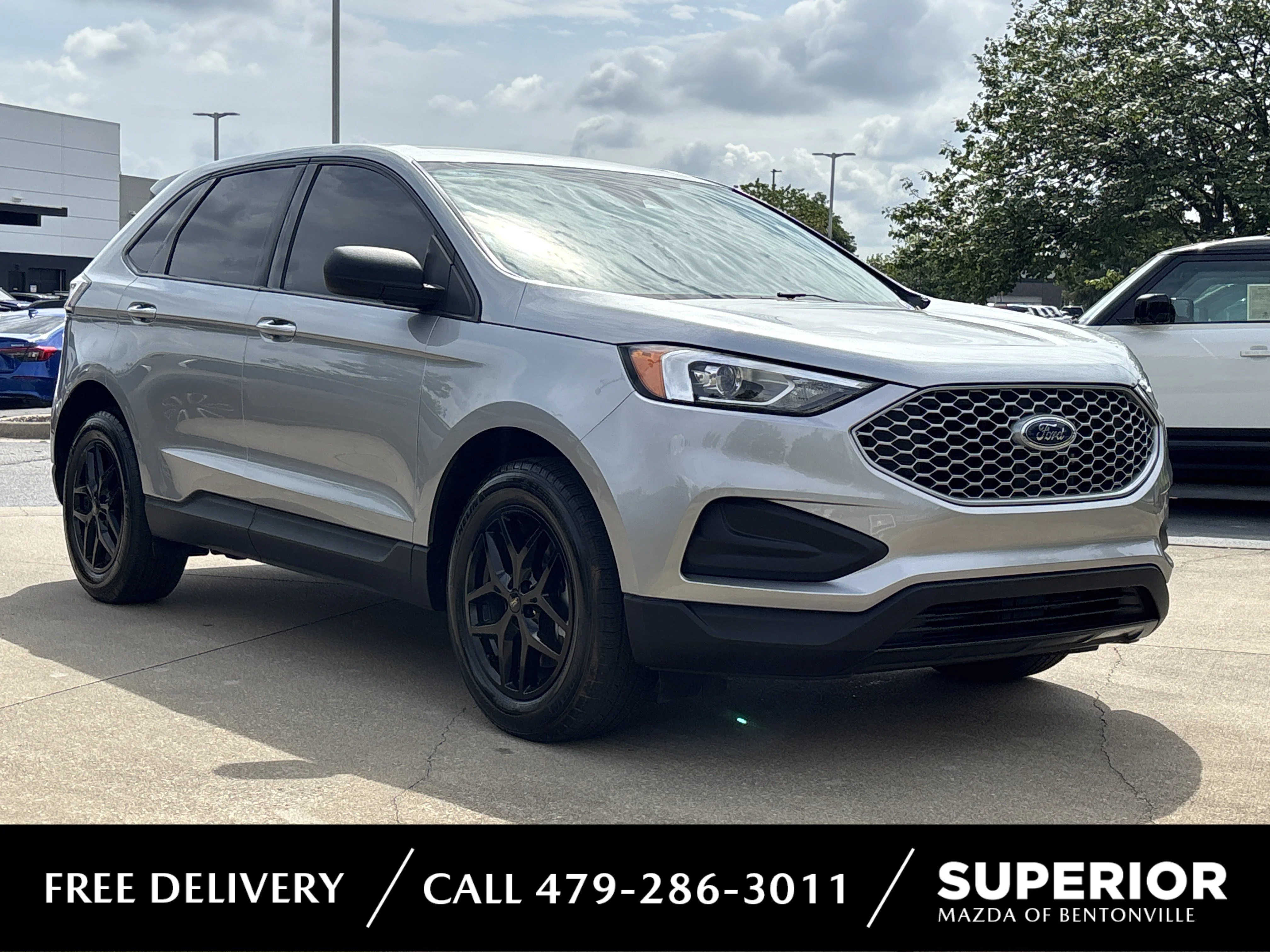 Used 2023 Iconic Silver Metallic Ford SE AWD image 1
