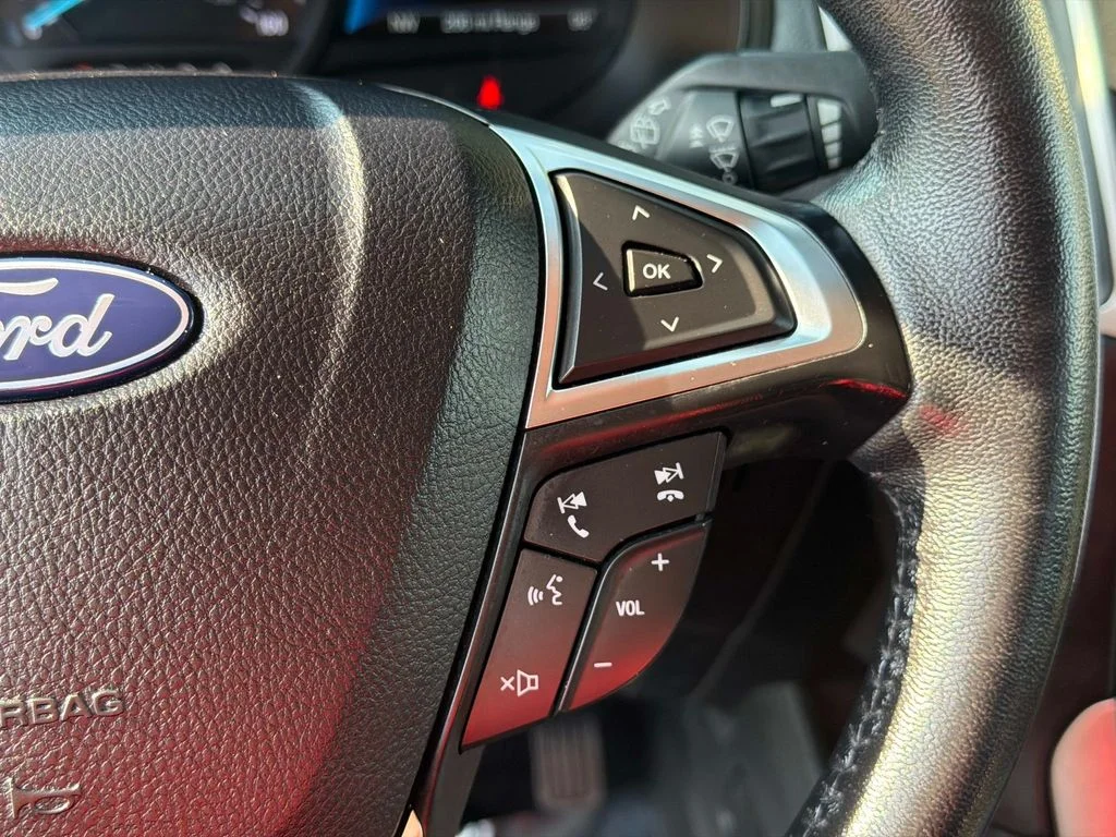 Used 2024 Agate Black Metallic Ford SEL image 28