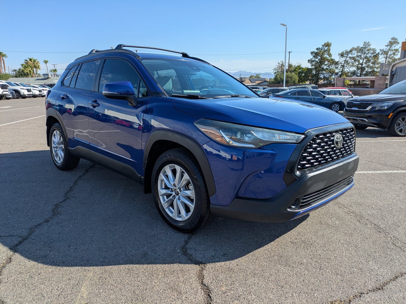 Used 2022 Blue Crush Metallic Toyota LE image 3
