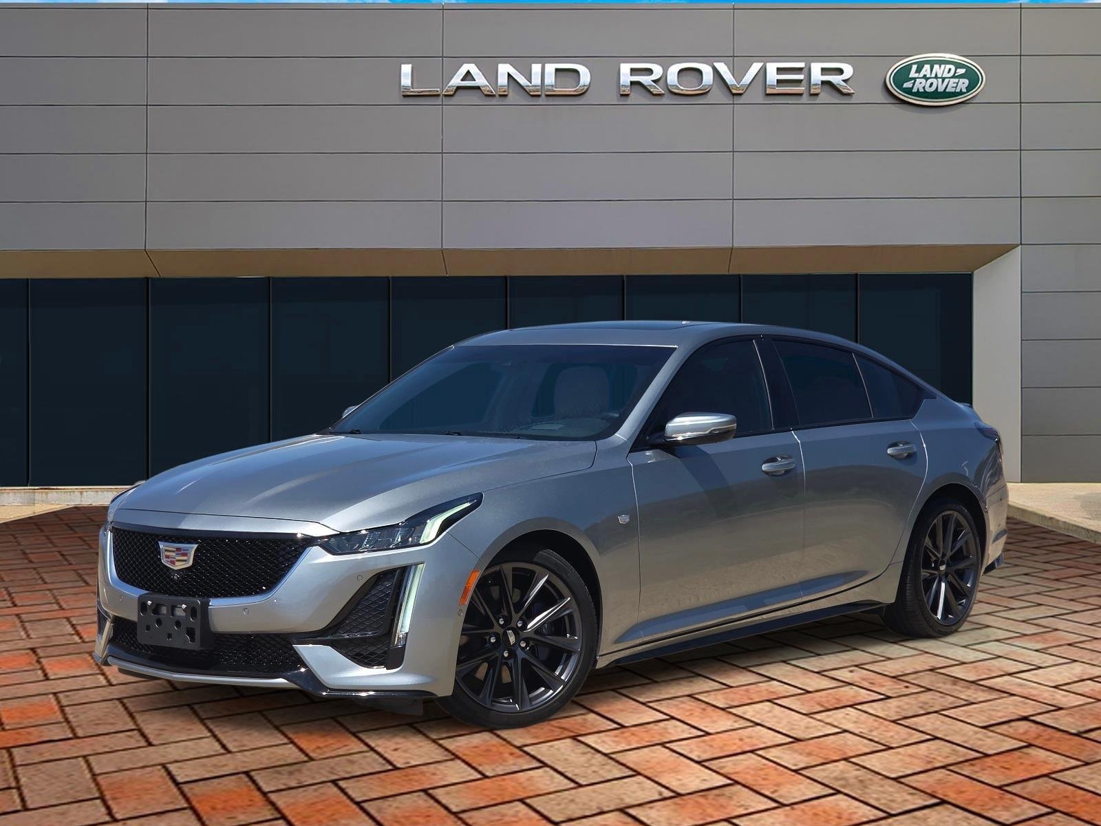 Used 2023 Argent Silver Metallic Cadillac Sport image 1