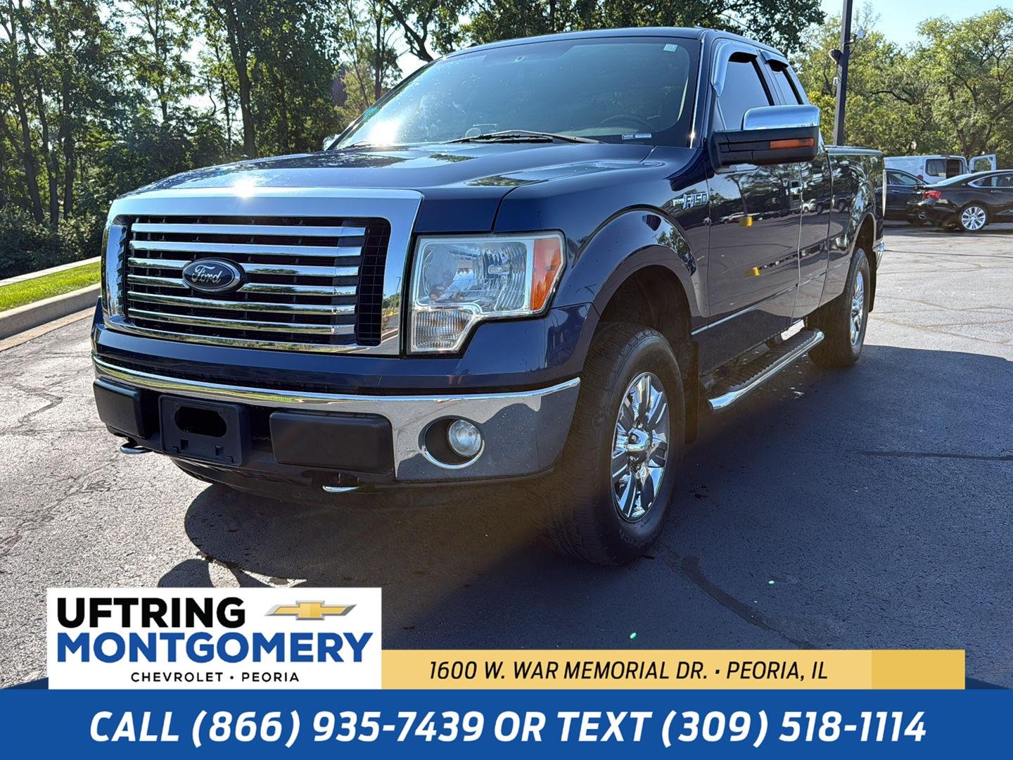 Used 2011 Dark Blue Pearl Metallic Ford Lariat image 1