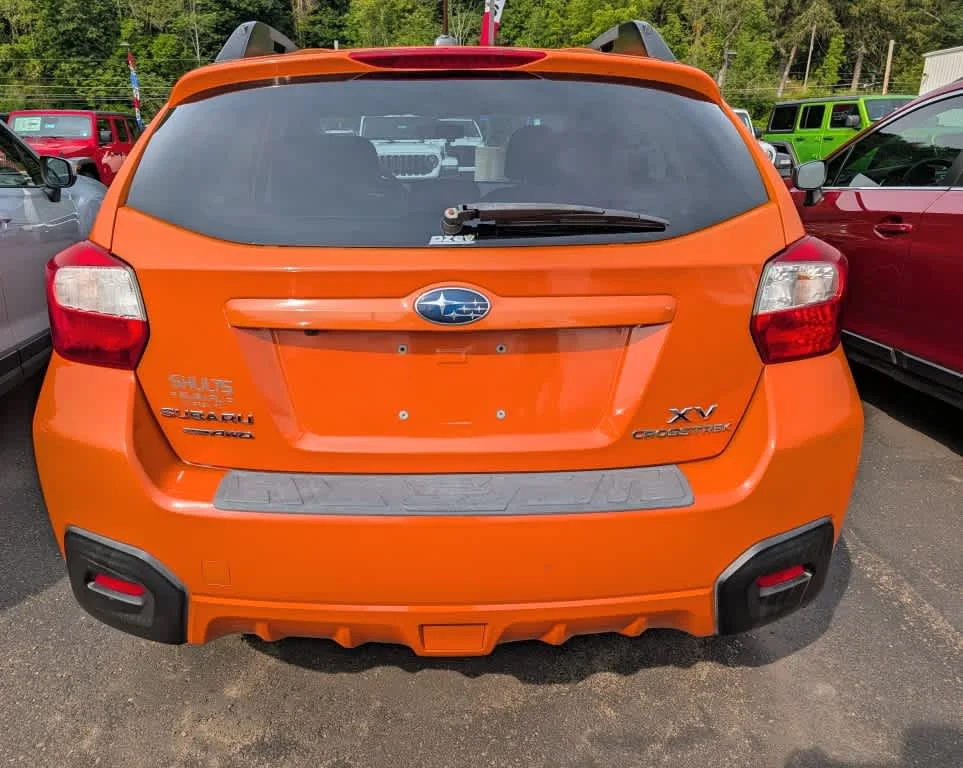 Used 2013 Tangerine Orange Pearl Subaru Limited image 5