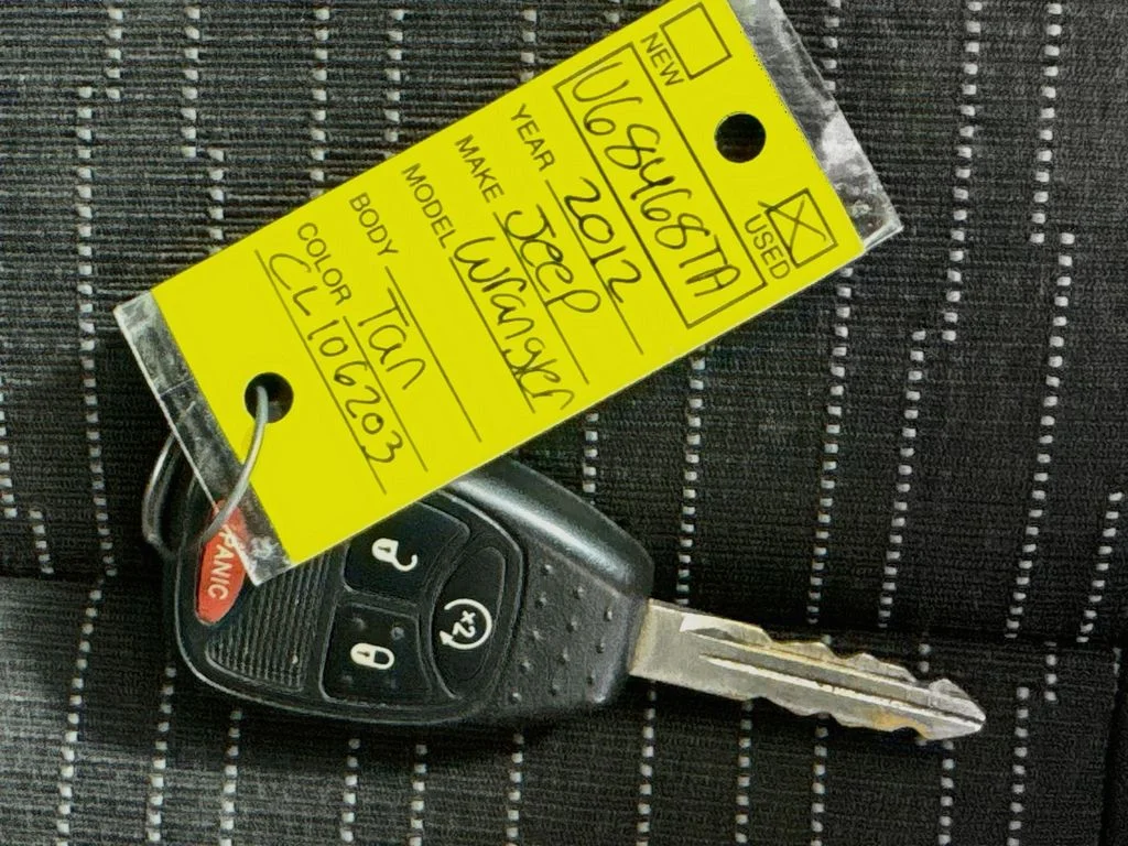 Used 2012 Beige Jeep Unlimited Sahara image 32