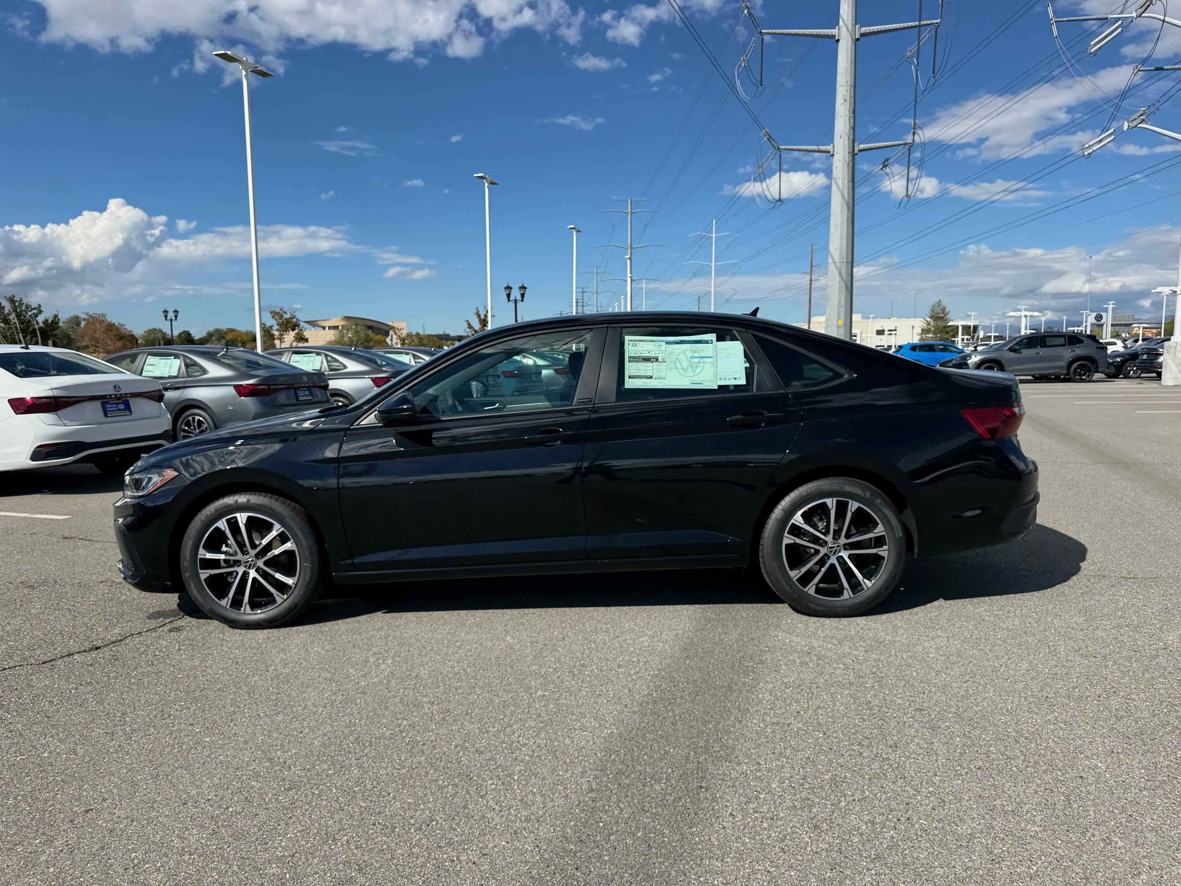 New 2026 Deep Black Volkswagen Sport image 2