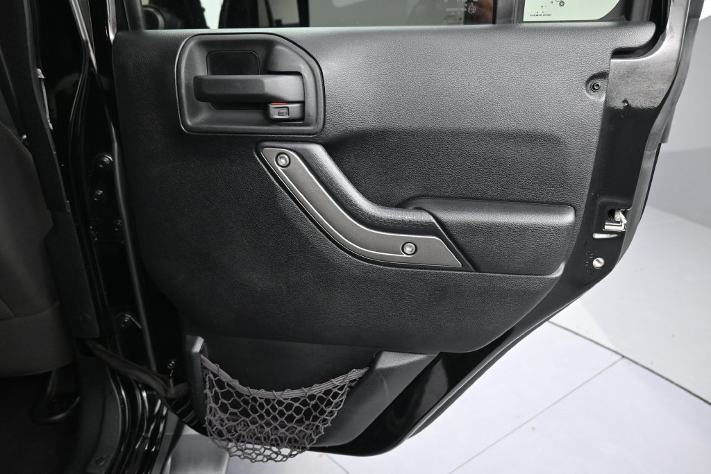 Used 2014 Black Clearcoat Jeep Unlimited Sport image 21