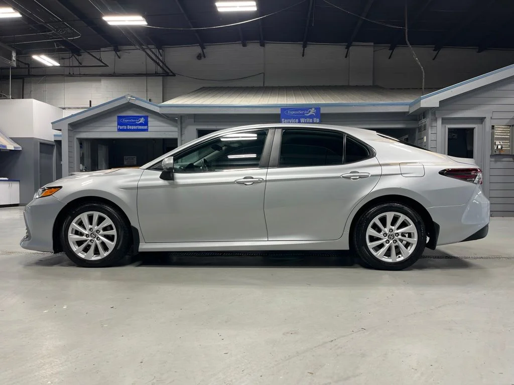 Used 2023 Celestial Silver Metallic Toyota LE image 4