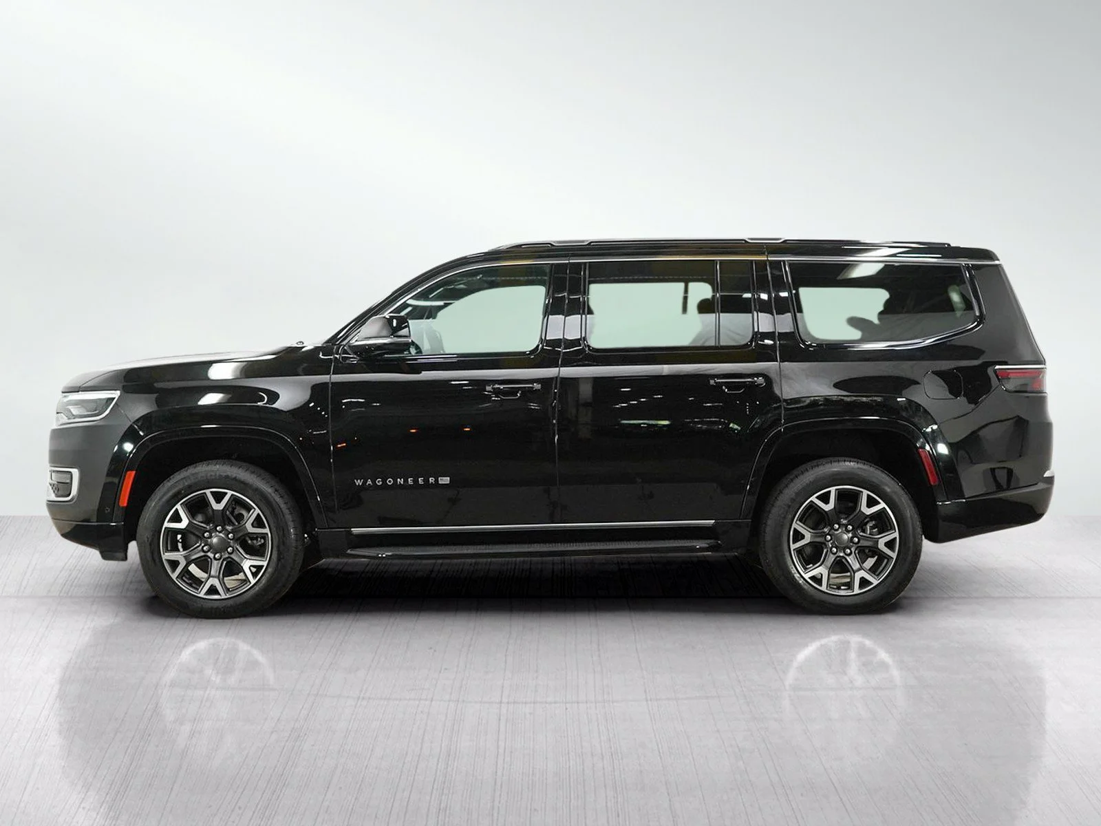Used 2024 Diamond Black Crystal Pearlcoat Jeep Series III image 2