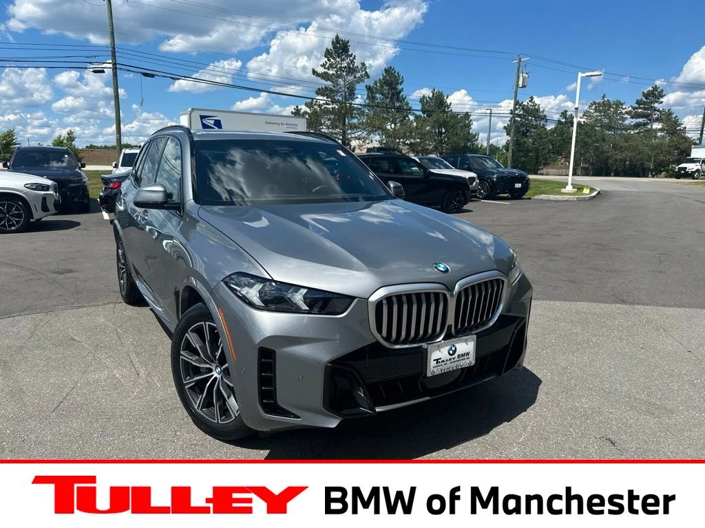 Certified Used 2024 Skyscraper Grey Metallic BMW xDrive40i image 1
