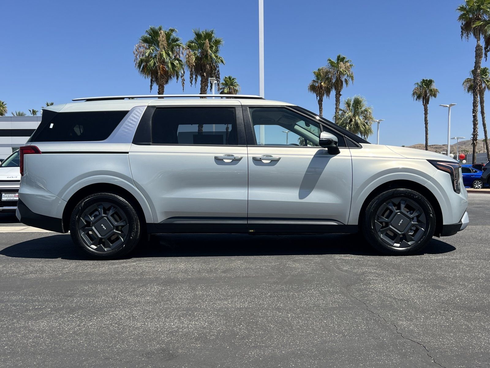 New 2026 Ivory Silver Kia EX image 2