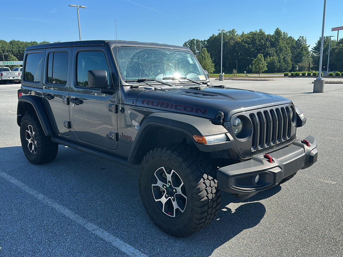 Used 2021 Granite Crystal Metallic Clearcoat Jeep Unlimited Rubicon image 1