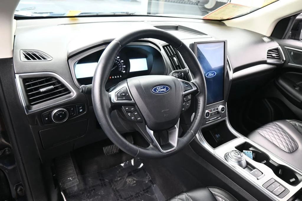 Used 2024 Black Metallic Ford Titanium image 11