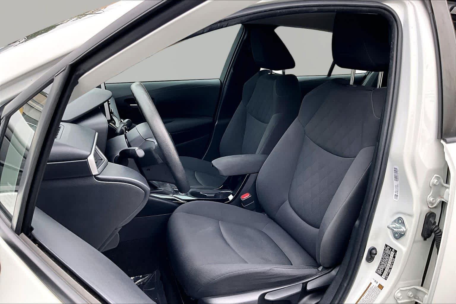 Used 2021 Super White Toyota LE image 8