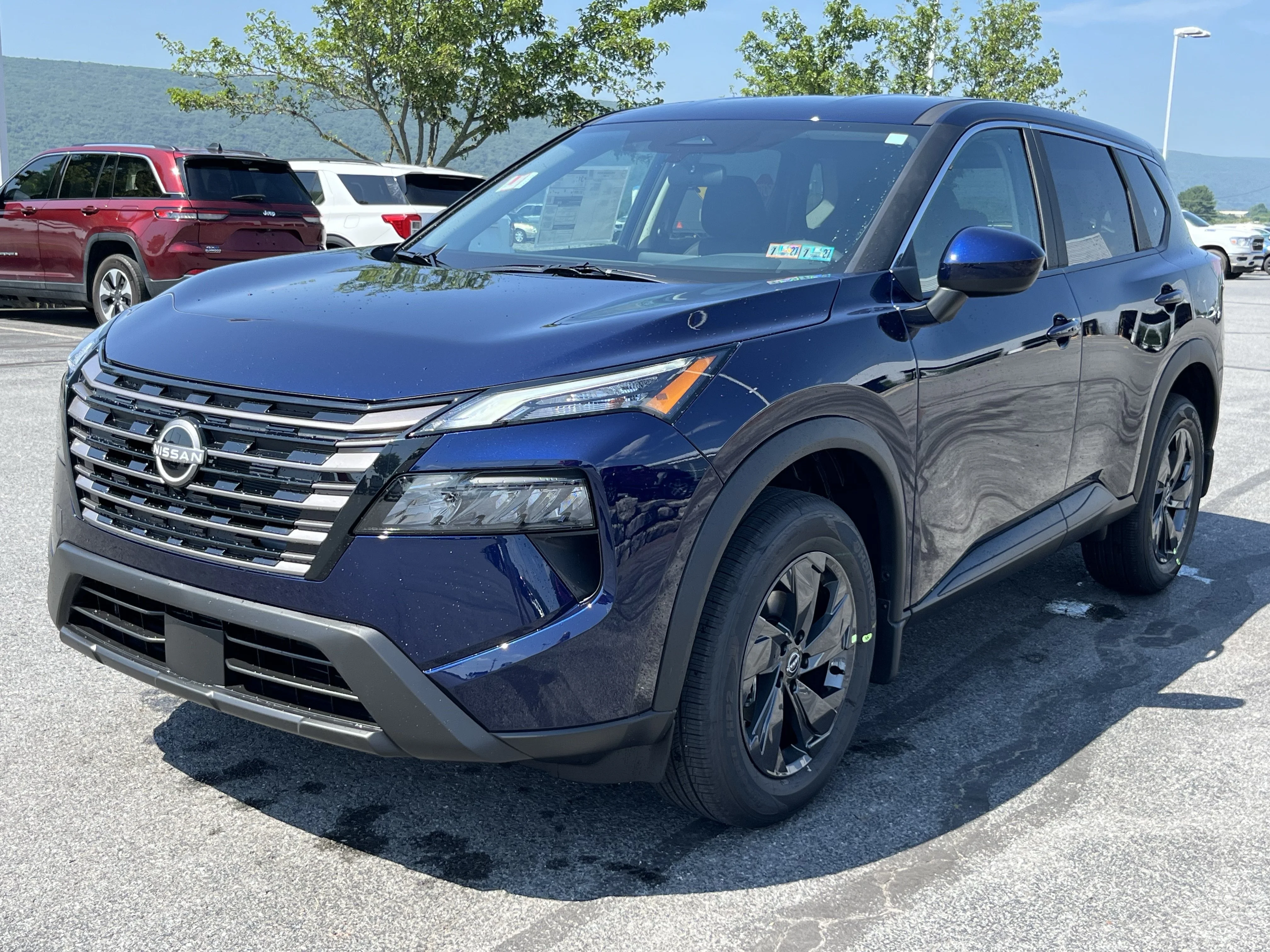 New 2026 Deep Ocean Blue Pearl Nissan SV image 11