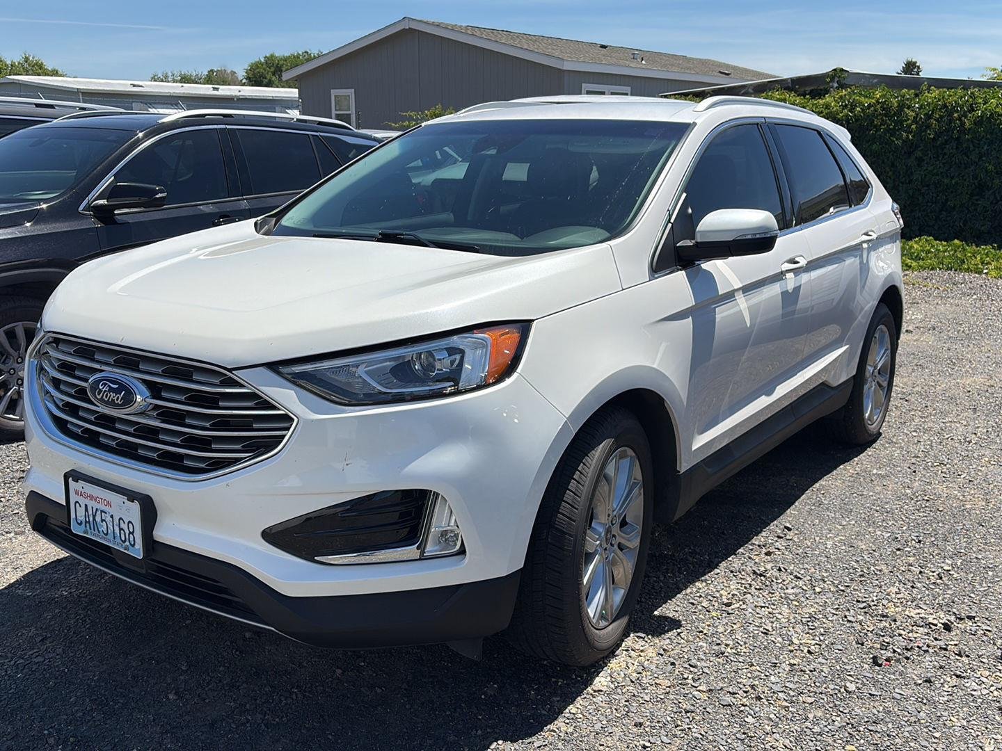 Used 2019 White Platinum Metallic Tri-Coat Ford Titanium image 1