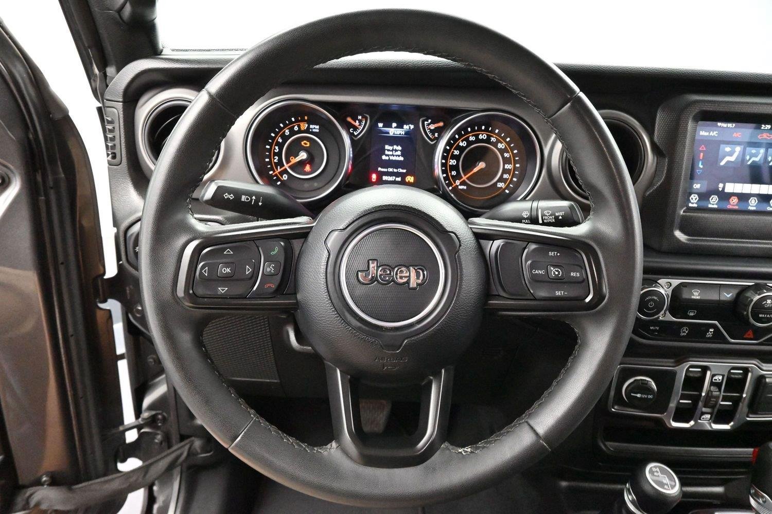 Used 2023 Granite Crystal Metallic Clearcoat Jeep Sport S image 15