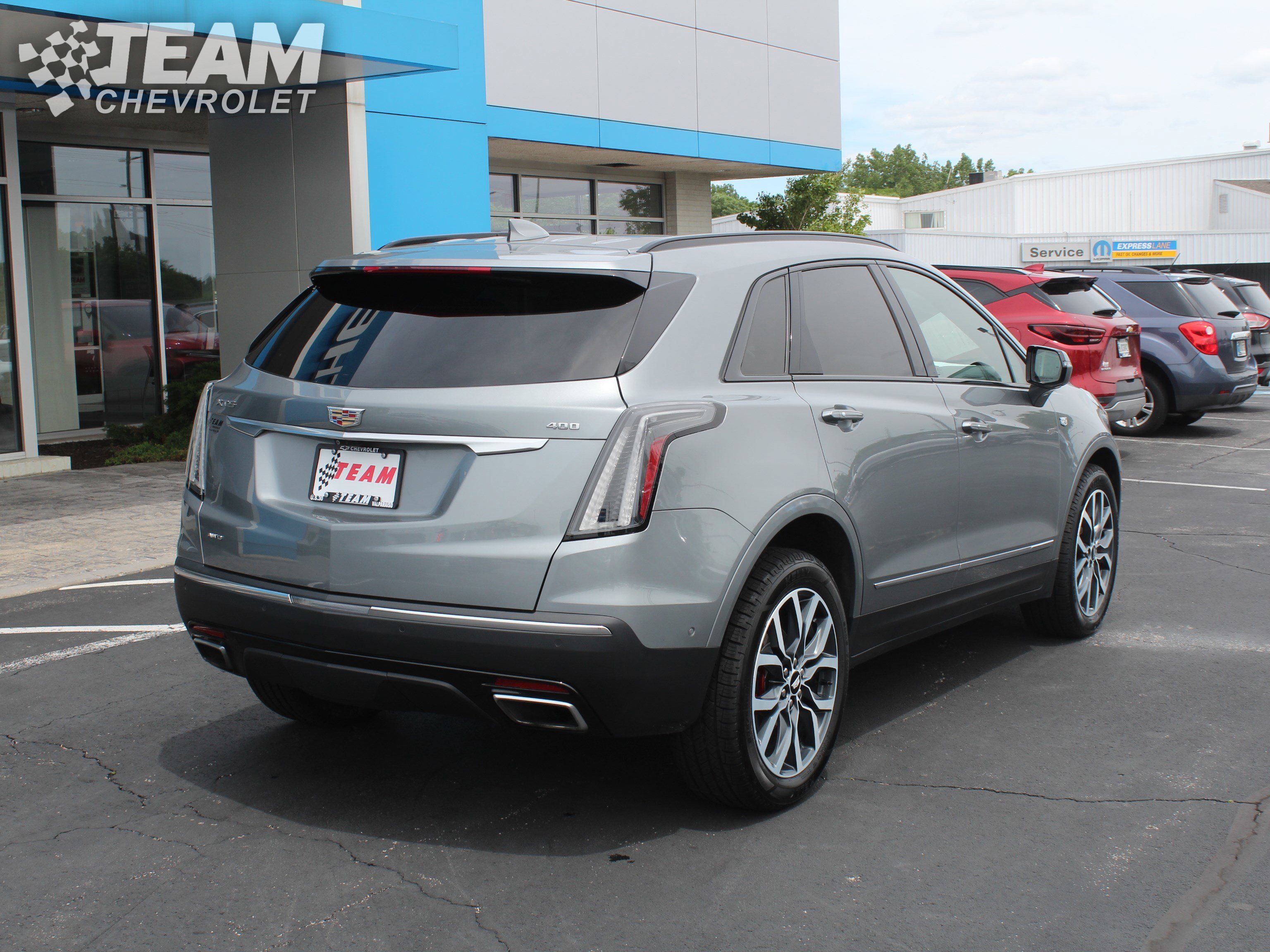 Used 2024 Argent Silver Metallic Cadillac Sport image 4