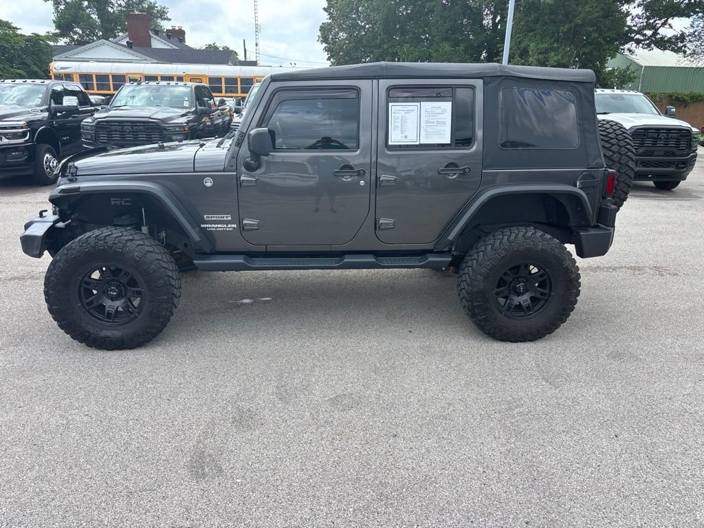 Used 2017 Gray Jeep Unlimited Sport image 2