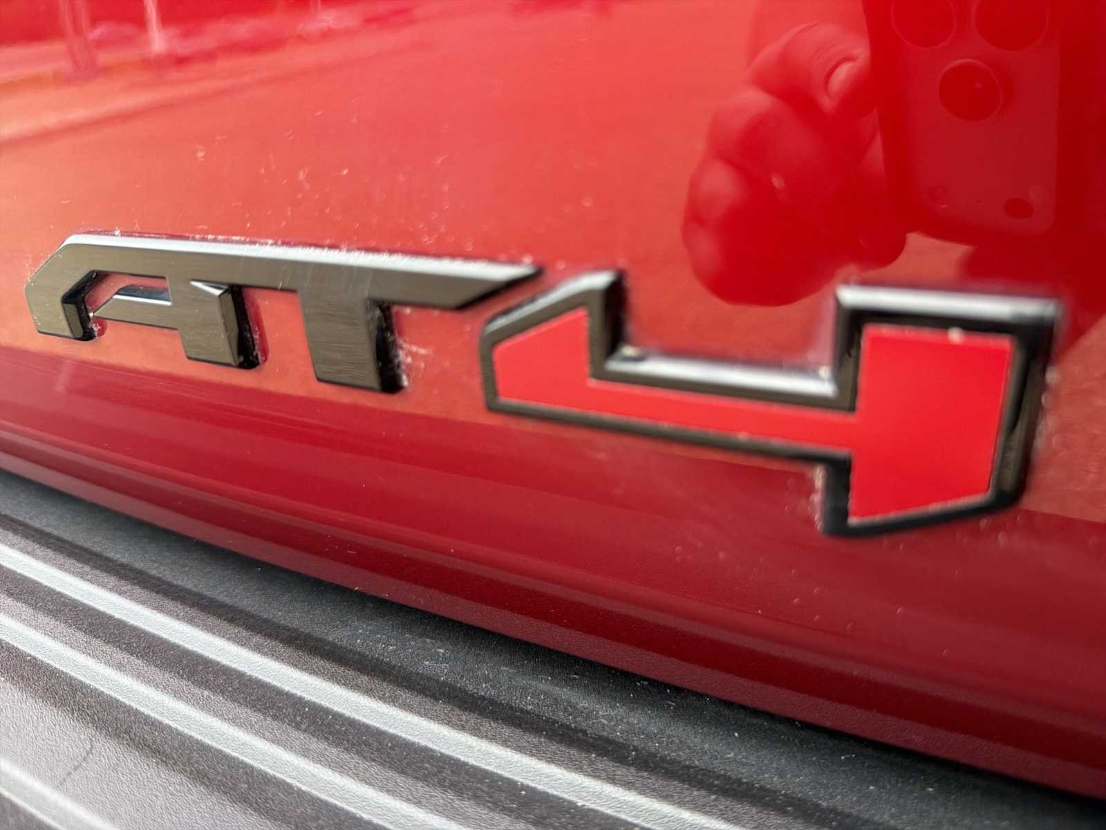 Used 2024 Volcanic Red Tintcoat GMC AT4 image 32