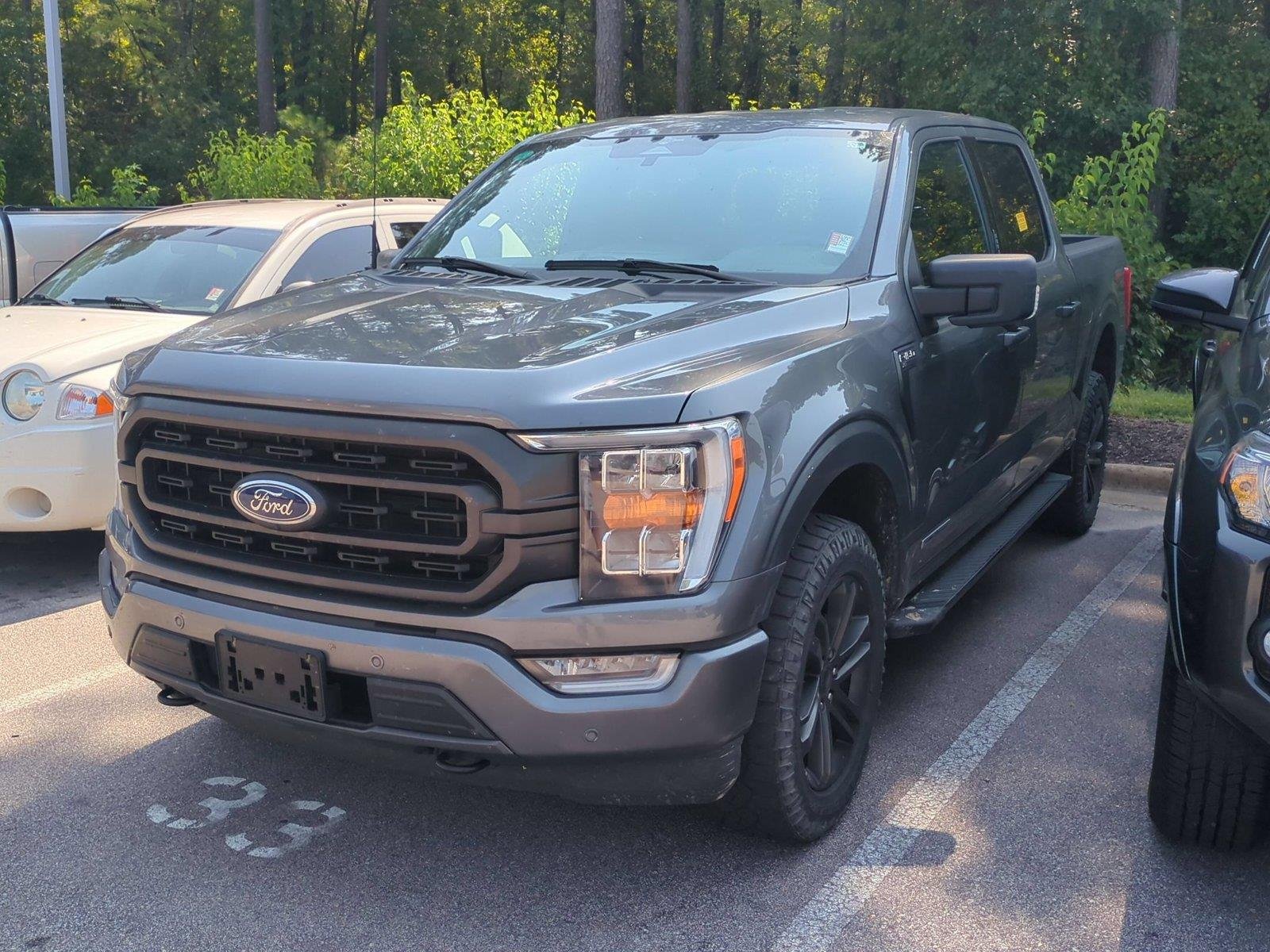 Used 2023 Carbonized Gray Ford XLT image 1