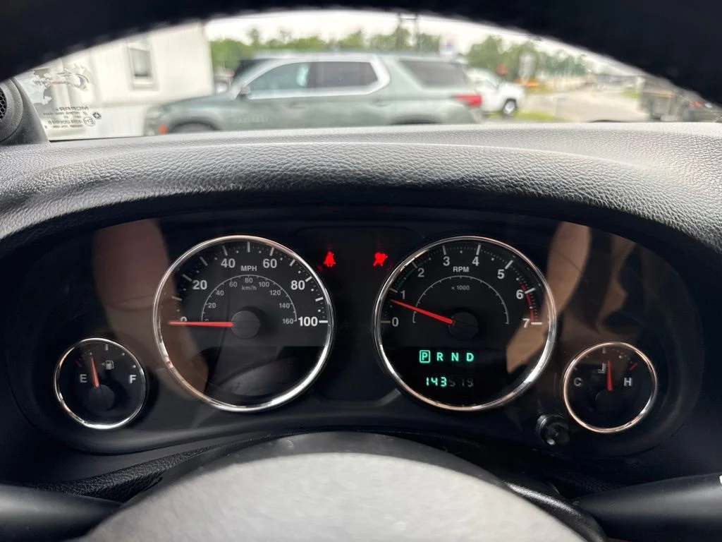 Used 2011 Orange Jeep Rubicon image 29